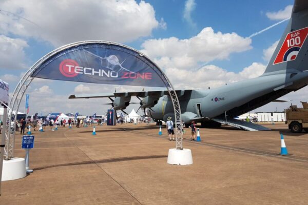 Truss welcome arch on concrete bases at airshow