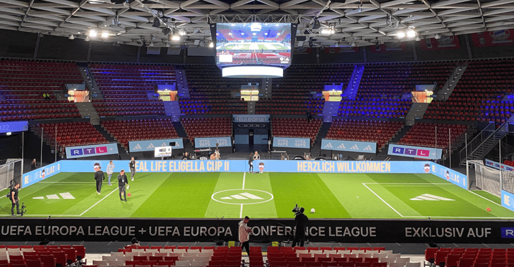 UEFA football match, event branding, empty pitch