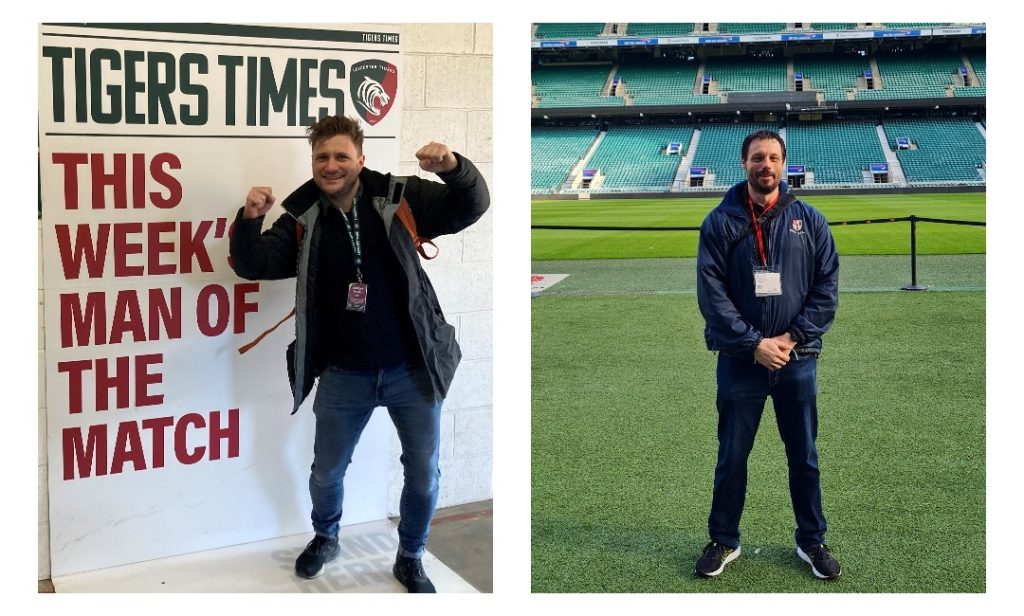 Two men working on a rugby event